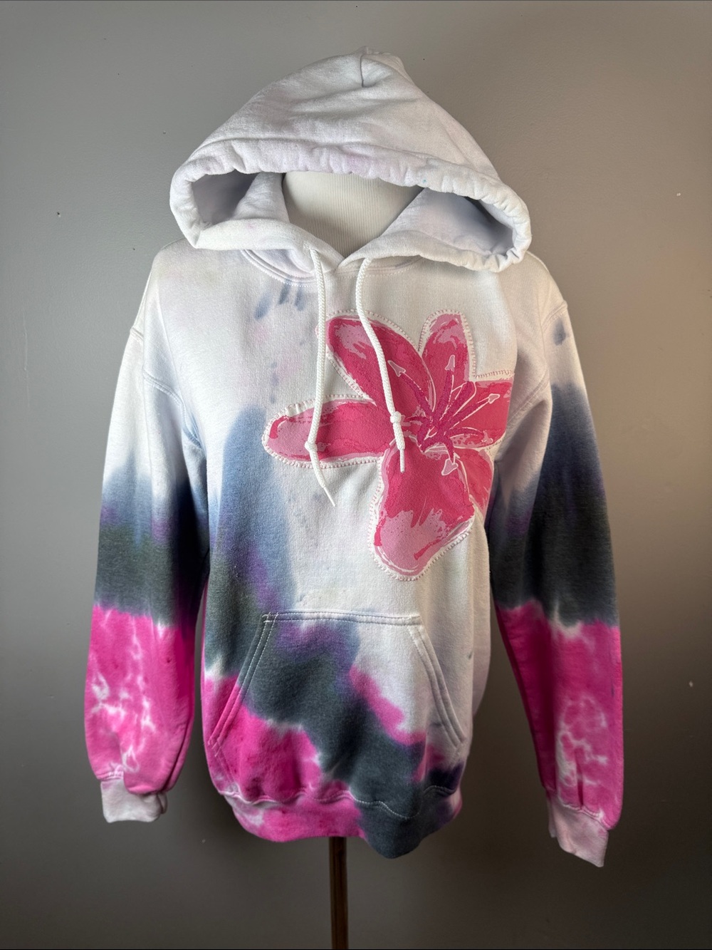 Tye dye hooded sweatshirt with flower patch